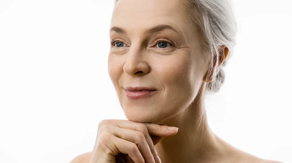 beautiful mature woman with well-proportion features in natural light - 3/4 portrait