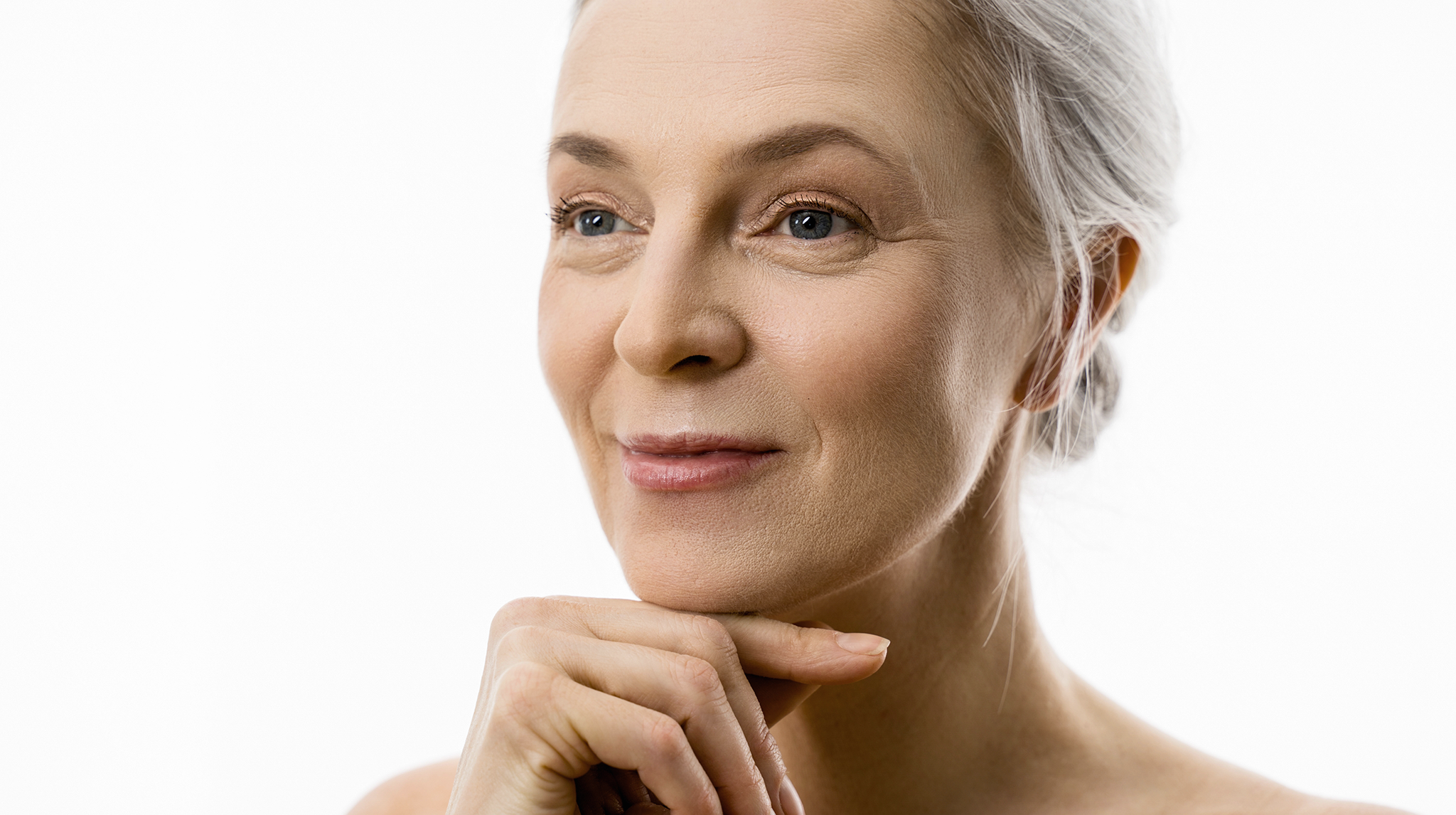 beautiful mature woman with well-proportion features in natural light - 3/4 portrait