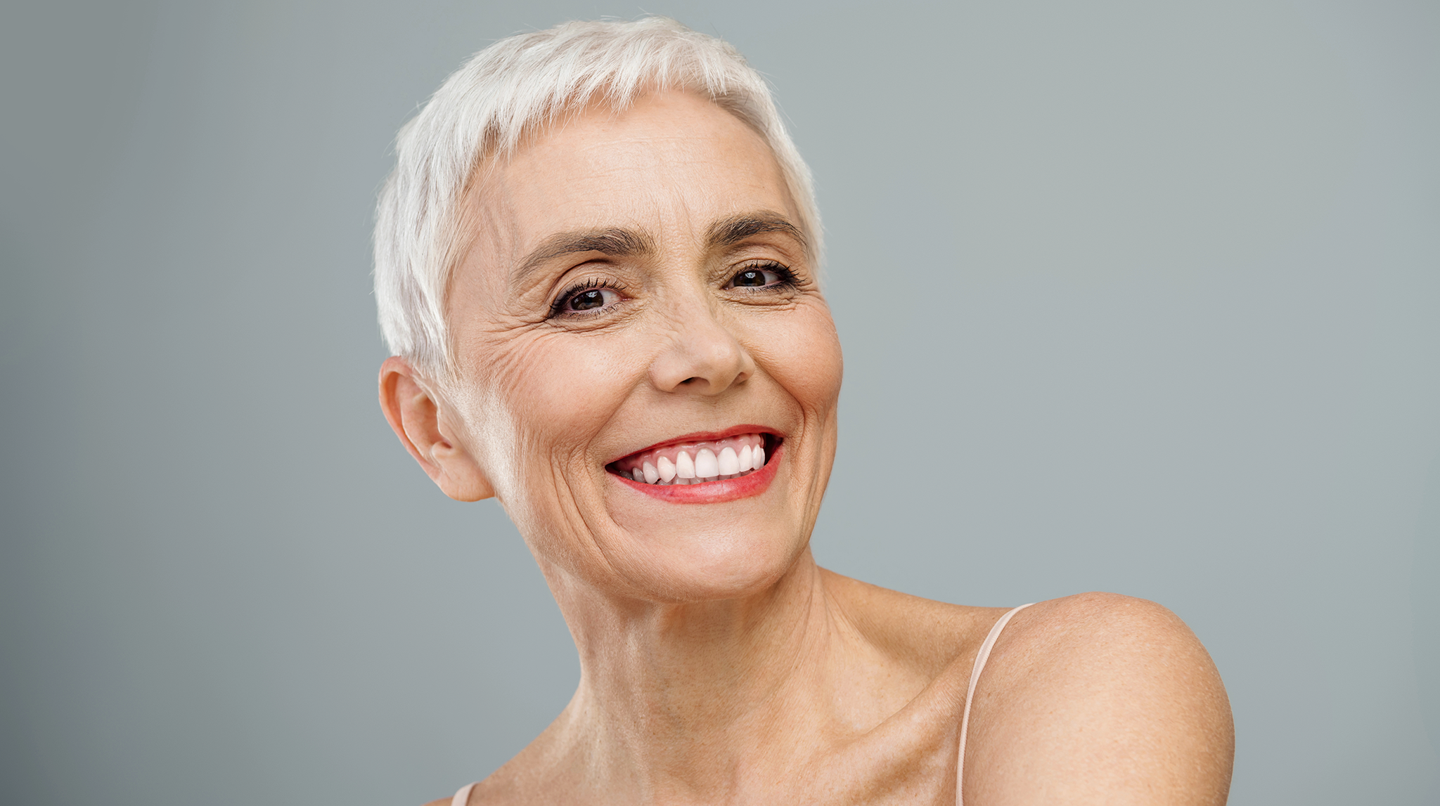 portrait of natural looking mature woman with healthy skin